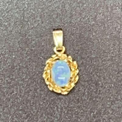 Opal Pendant With Gold Background