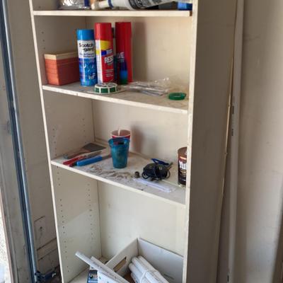 Cabinet With Four Shelves And Household Goods