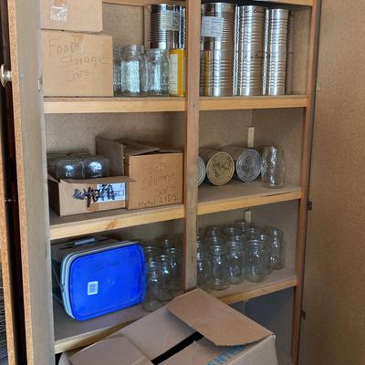 Emergency and Food Prep Supplies and the Large Storage Cabinet With Shelves