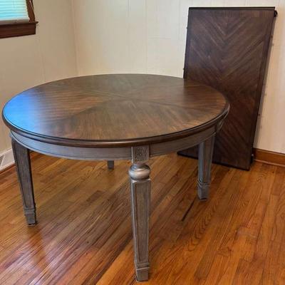 Round Wooden Dining Table with Carved Legs & Leaf Insert