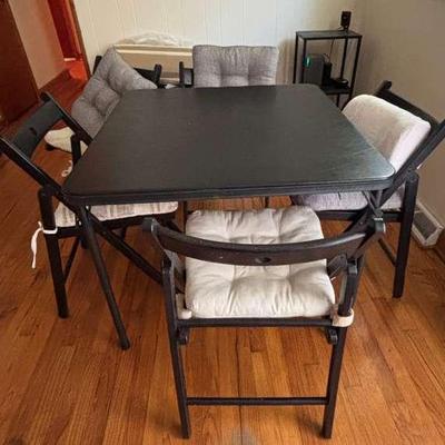 Black Folding Table with 5 Folding Chairs & Cushions