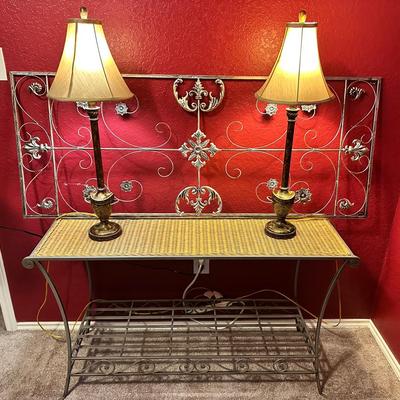 Metal And Wicker Table, Two Lamps, And Metal Filigree Wall Decor