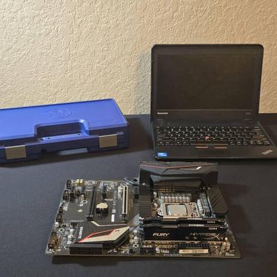 Laptop, Smith & Wesson case, Gaming Motherboard