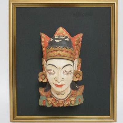 Sale Photo Thumbnail #67: 1066	HAND CARVED WOOD INDONESIAN HEAD FRAME, APPROXIMATELY 16 IN X 18 IN, OVERALL
