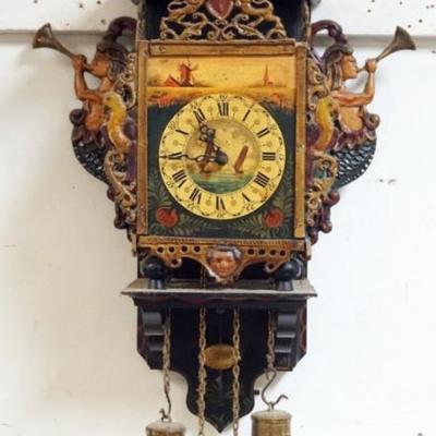 Sale Photo Thumbnail #137: 1136	CONTINENTIAL WEIGHT DRVIEN WALL CLOCK WITH PAINT DECORATED METAL FRETWORK, RAMPART LIONS, BIRDS, MERMAIDS, ETC., APPROXIMATELY 12 IN X 7 IN X 19 IN H

