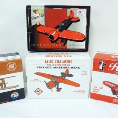 Sale Photo Thumbnail #103: 1102	4 DIE CAST AIRPLANE COIN BANKS IN ORGINAL BOXES
