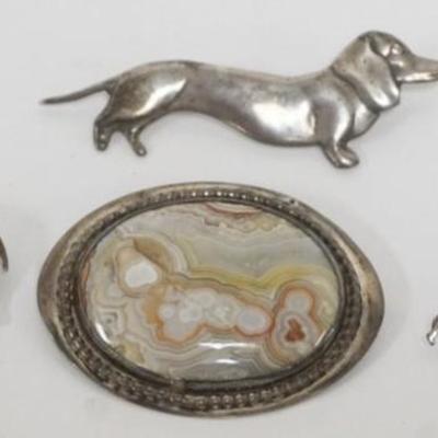 Sale Photo Thumbnail #207: 1205	4 STERLING SILVER PINS, 2 DACHSHUND, ELEPHANT WITH ONYX AND QUARTZ PIN HAS CHIP IN STONE, TOTAL WEIGHT 1.26 INCLUDING STONES
