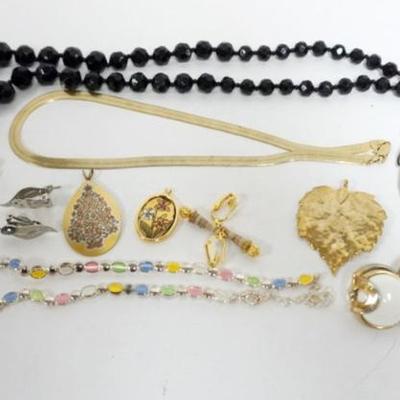 Sale Photo Thumbnail #215: 1213	5 JEWELRY SETS, SOME MARKED BY MAKER, GOLD PLATED HERRINGBONE NECKLACE & BRACELET, 2 REED & BARTON PENDANTS AND GOLD LEAF PENDANT
