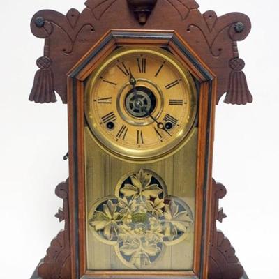 Sale Photo Thumbnail #136: 1135	INGRAHAM SHELF CLOCK WITH NICE GILT REVERSE DECORATED GLASS DOOR, APPROXIMATELY 15 IN X 16 IN X 21 IN
