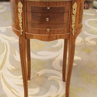 Sale Photo Thumbnail #278: 1276	SMALL OVAL 3 DRAWER STAND WITH BRONZE GALLERY TOP AND APPLIED MOUNTS, APPROXIMATELY 16 IN X 13 IN X 29 IN H
