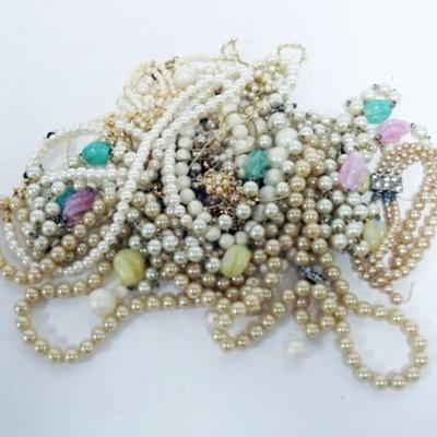 Sale Photo Thumbnail #210: 1208	10 PEARL NECKLACES AND 2 PEARL BRACELETS AS FOUND
