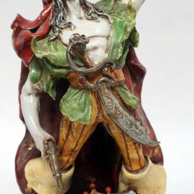 Sale Photo Thumbnail #62: 1061	ITALIAN TERRACOTTA FIGURE OF A PIRATE EXAMINING JEWELS FROM HIS TREASURE CHEST, MARKED ON BASE *PERSEC ITALY*, APPROXIMATELY 15 IN H

