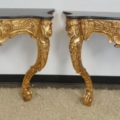 Sale Photo Thumbnail #261: 1259	PAIR OF GILT WOOD MARBLE TOP WALL MOUNTED STANDS, APPROXIMATELY 46 IN X 14 IN X 33 IN H
