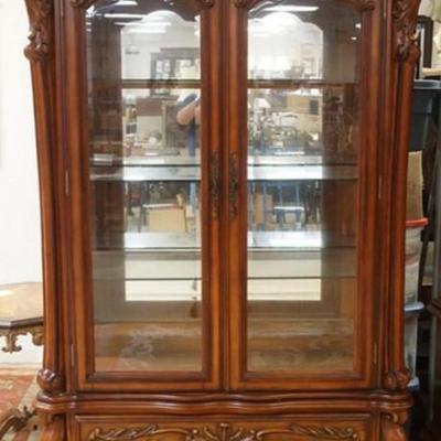 Sale Photo Thumbnail #255: 1253	ORNATE FRENCH STYLE 2 PART CRYSTAL CABINET WITH MIRRORED BACK, GLASS SHELVES, INTERIOR LIGHTS AND LOWER DRAWER ON CARVED PAW FEET, APPROXIMATELY 50 IN X 19 IN X 89 IN H
