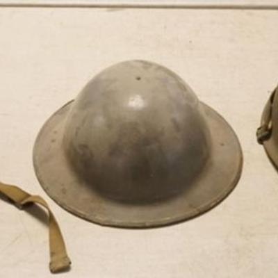 Sale Photo Thumbnail #125: 1124	GROUP OF 3 METAL MILITARY HELMETS
