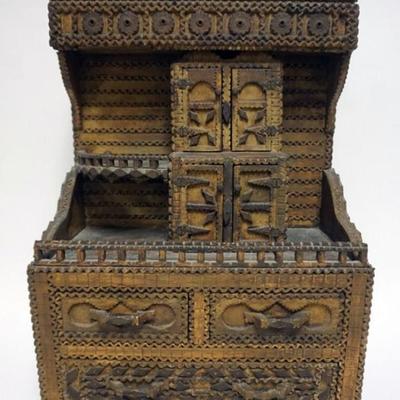 Sale Photo Thumbnail #86: 1085	UNUSUAL TRAMP ART TABLE TOP SEWING CABINET, HAVING 3 DRAWERS, 4 DOORS AND LIFT TOP COMPARTMENT FOR THREAD, APPROXIMATELY 14 IN X 8 IN X 23 IN H

