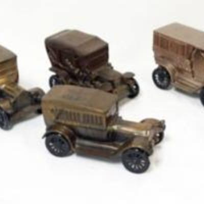 Sale Photo Thumbnail #107: 1106	GROUP OF ASSORTED CAST METAL CAR AND RELATED BANKS
