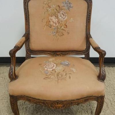 Sale Photo Thumbnail #265: 1263	VINTAGE UPHOLSTERED ARM CHAIR IN CARVED FRAME, APPROXIMATELY 28 IN X 22 IN X 70 IN H
