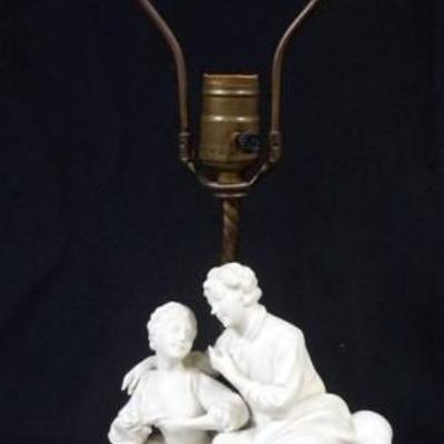 Sale Photo Thumbnail #70: 1069	PARIAN TABLE LAMP ON METAL BASE WITH IMAGE OF COURTING SCENE, APPROXIMATELY 24 IN, OVERALL
