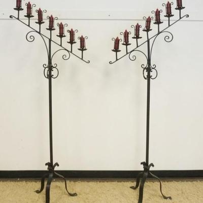 Sale Photo Thumbnail #253: 1251	PAIR OF GOTHIC STYLE FLOOR STANDING WROUGHT IRON CANDLEABRAS, ADJUSTABLE IN HEIGHT, EACH APPROXIMATELY 29 IN X 19 IN X 77 IN H
