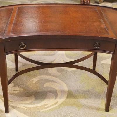 Sale Photo Thumbnail #275: 1273	MAHOGANY KIDNEY SHAPED LEATHER TOP COFFEE TABLE WITH 1 DRAWER, APPROXIMATELY 35 IN X 18 IN X 19 IN H
