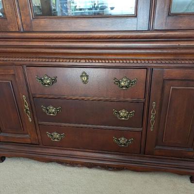Sale Photo Thumbnail #38: Available for PRESALE-China cabinet with table and 6 chairs for $499.
Bassett China cabinet with light bridge