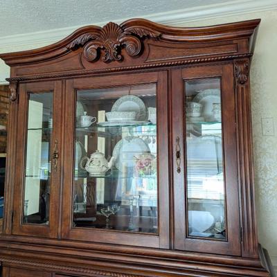 Sale Photo Thumbnail #37: Available for PRESALE-China cabinet with table and 6 chairs for $499.
Bassett China cabinet with light bridge