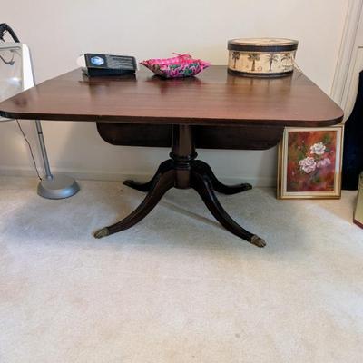 Antique Pedestal base drop leaf table