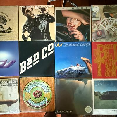 3 Sealed Vinyl Albums 
9 Open Vinyl Albums

