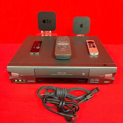 2 Apple TV units and Toshiba VHS Player with Remotes