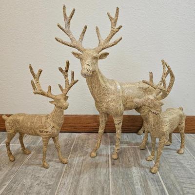 Lot #228 - Set of Three Paper Mache Deer Sculptures with Newspaper Print