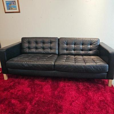 Lot #188 - Ikea Karlstad Black Leather Tufted Sofa