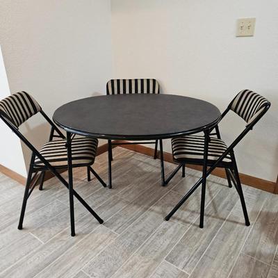 Lot #124 - Folding Table and 3 Chairs