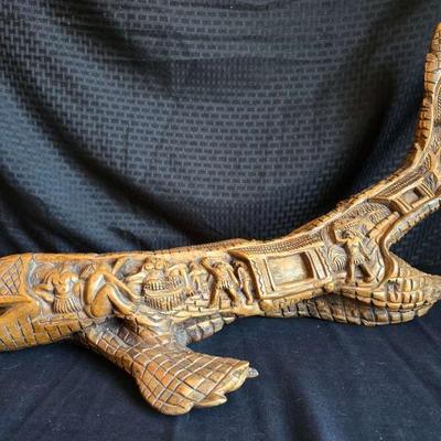 Pr114 hand carved sculpture depicting the legend of the island people