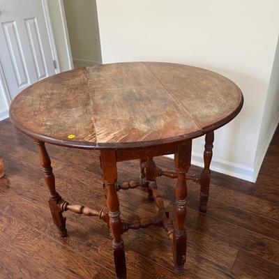 $125 Antique gate leg table; approx. 29.5" x 35.5" (with legs extended)