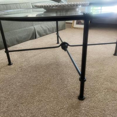 $150 Contemporary glass & metal coffee table; approx. 16" x 36 1/2"