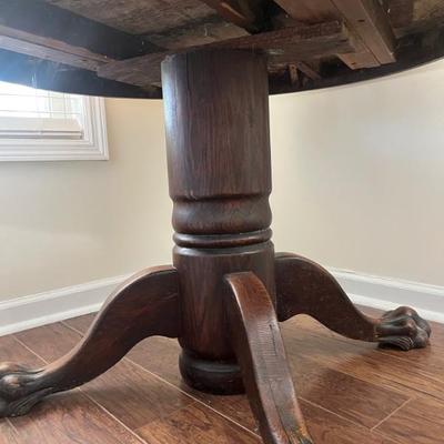 $250 Antique oak pedestal table; approx. 28" x 42" dia.