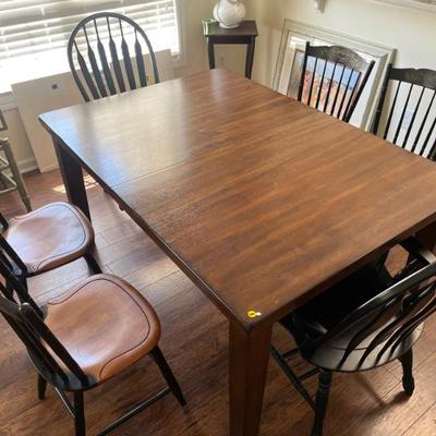 $150 Gorgeous wood dining table with hide-away leaf; approx. 30" x 78" (extended) x 42" (leaf is 18") 