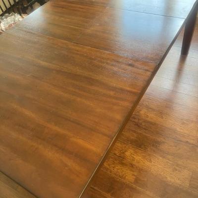 $150 Gorgeous wood dining table with hide-away leaf; approx. 30" x 78" (extended) x 42" (leaf is 18") 
