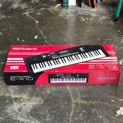 Sale Photo Thumbnail #210: Roland E-X10 Portable Arranger Keyboard