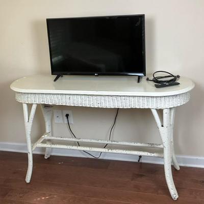 Flat Screen 32” TV with White Wicker Console Table