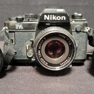 NIKON FILM CAMERA, LENSE, AND A VIVITAR LENSE