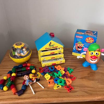 Fisher Price Wobble Ball, Curious George Crayon Keeper, Mr Potato Head & more