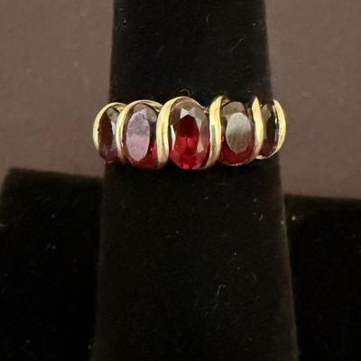 Lot 436: 10K Gold Ring with Red Oval Simulated Gemstones – 2.8 Grams