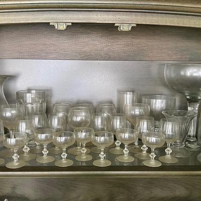 Lot 300: Clear Glass Galore - Aperitif Glasses, Lidded Jars, Candle Holders, Etc 