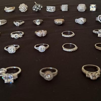 Lot 401: Lot of 33 Sterling Silver CZ & Gemstone Rings (.925) – 156.3 Grams
