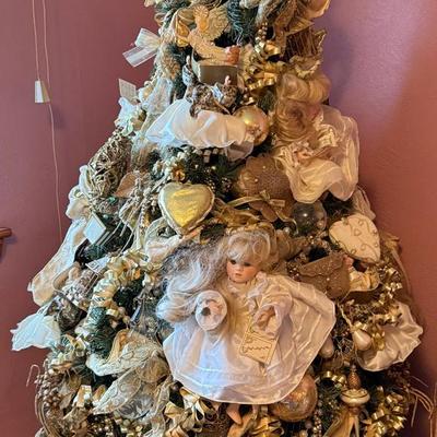 Lot 459: Pre-Decorated Victorian Style Christmas Tree with Porcelain Dolls, Gold Ornaments & Ribbons
