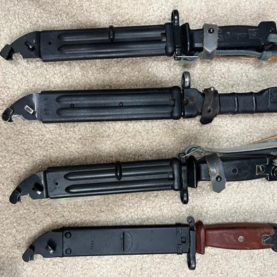 Lot 348: AKM Bayonets with Scabbards (4 Total)  Set of four AKM-style bayonets with scabbards. Mixed