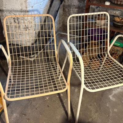 Pair Of White Metal Mesh Stackable Chairs