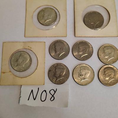 Nine Kennedy Half Dollars